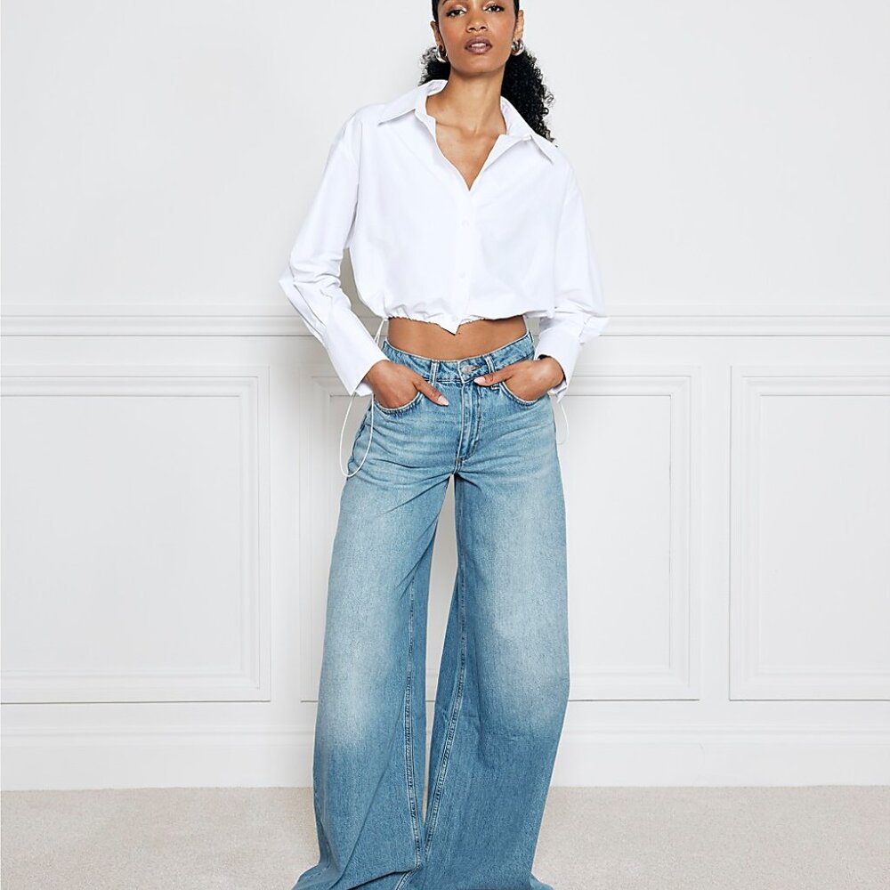 BNWT Blue mid rise elastic back palazzo jeans